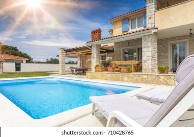 Holiday house with pool - Shutterstock ID 710428765