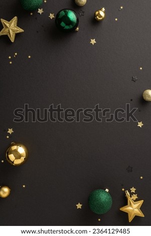 Holiday magic unfolds: Vertical top view of luxurious green and gold ornaments, sparkling stars, and confetti on a black base, ideal for your festive greetings or advertisements