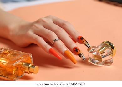 Holiday Manicure On Long Square Nails With Golden Sequins, Black Shiny Nail Polish And Craquelure Matte Black Coating.