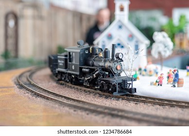 Holiday Model Train Display With Steam Engine And Church With Miniature Figures