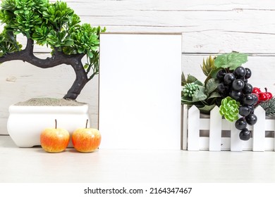 Holiday Party Invitation Mockup. Vertical White Card 5x7 On A Table With Fruits.