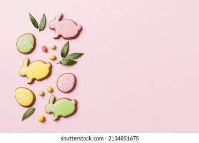 holiday preparation Multi colors Easter eggs with cookies on colored background . Pastel color Easter eggs. holiday concept with copy space. - Powered by Shutterstock