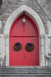 Holiday Red Church Doors Up Steps With Iron Railing