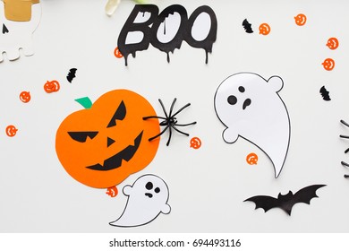 Holidays, Decoration And Party Concept - Halloween Paper Decorations Over White Background