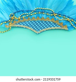 Holidays image of mardi gras and brazil masquarade carnival decorations over blue background. view from above