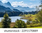 Holidays in the mountains in Upper Bavaria: Fantastic mountain scenery at Lake Grubsee, near Krün and Klais, view to Zugspitze