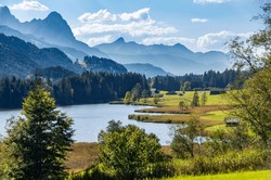 Holidays In The Mountains In Upper Bavaria: Fantastic Mountain Scenery At Lake Grubsee, Near Krün And Klais, View To Zugspitze