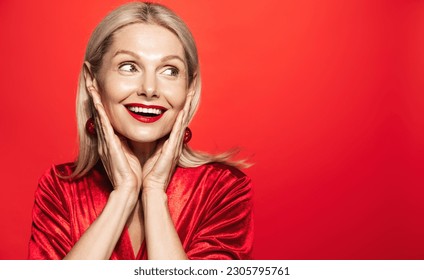 Holidays and women beauty concept. Smiling beautiful woman 50 years, mature lady with perfect skin and smile, looking aside happy, posing for Christmas advertisement. - Powered by Shutterstock