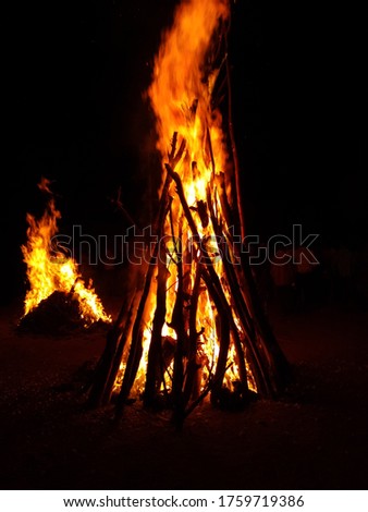 Holika dahan indian festival celebration  Photograph of a giant bonfire lit for the auspicious festival of lohri or Holi or Holika Dahan