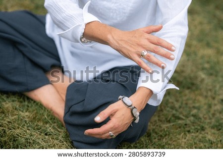 Holistic healing exercise using gentle hand movements to encourage natural energy flow, relaxation, stress reduction and inner balance.