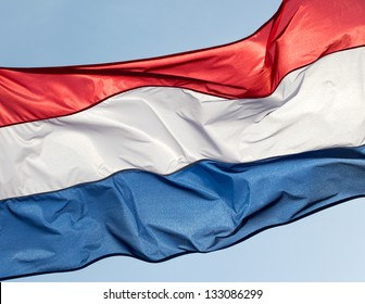 Holland Flag Against Blue Sky