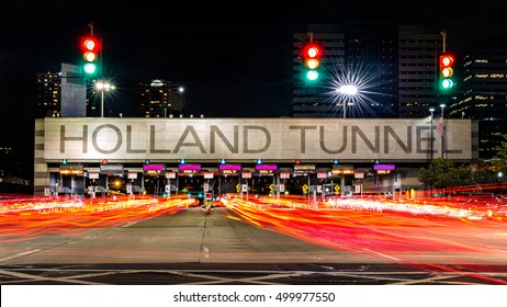 Holland Tunnel toll booth. Owned and operated by Port Authority, a joint venture between the U.S. states governments of NY and NJ, Holland Tunnel crosses Hudson River between Manhattan and Jersey City