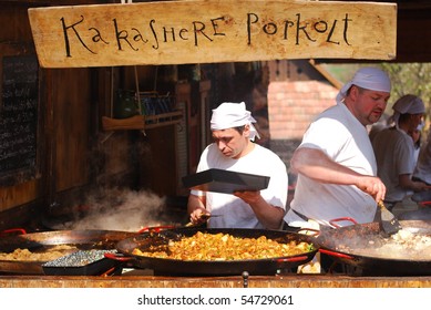 HOLLOKO, HUNGARY - APRIL 12 : Cooks Preparing  Traditional Hungarian Cock Testicle Stew At The Easter Festival At April 12, 2009 In Holloko, Hungary.