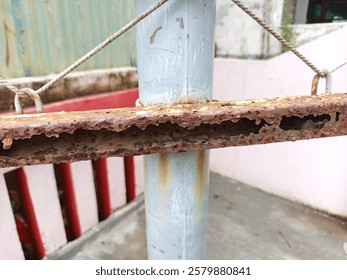 Hollow iron that rusts and eventually has holes