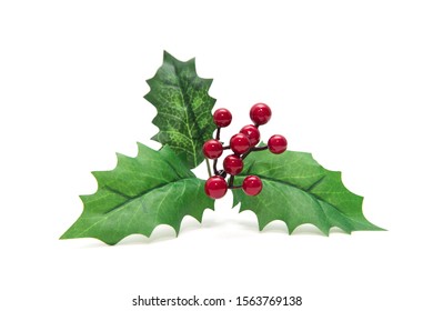 Holly berry leaves Christmas decoration isolated on white background - Shutterstock ID 1563769138
