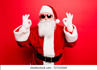 Holly jolly x mas noel! December surprise, travel, trips, party time! Playful cool funny naughty tourist santa grandfather is showing accept signs, fooling around, in trendy specs, so confident