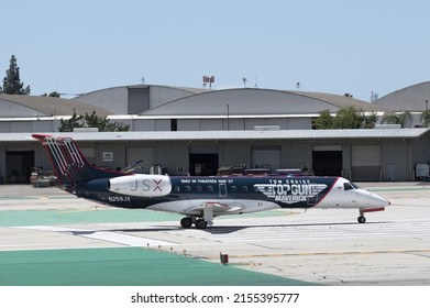 Hollywood Burbank Airport, California, USA - May 11, 2022: Image Of JSX Embraer ERJ-135LR Jet With Registration N259JX Departing. Plane Shown Painted In A Top Gun Maverich Scheme.