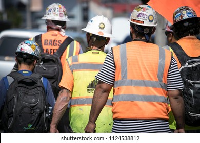 Hollywood, CA - June 29, 2018: Construction Crew Members Walk Off The Job Site.