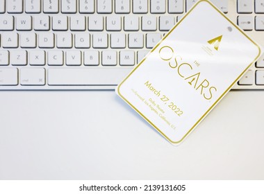 Hollywood, CA, USA, March 2022: White Badge With The Academy Awards Logo And The Date Of The Event On A Computer Keyboard. The Academy Award, Aka Oscar, Is The World's Most Prestigious Film Award