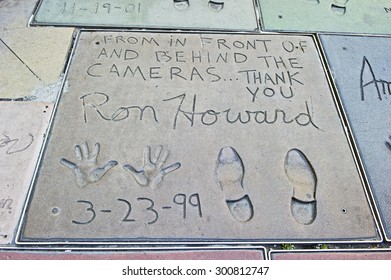 HOLLYWOOD - CALIFORNIA, AUG. 15, 2014: Hand And Foot Imprints With Inscription In Concrete Of Famed Movie Star Ron Howard At Graumans Chinese Theater In Hollywood, California USA