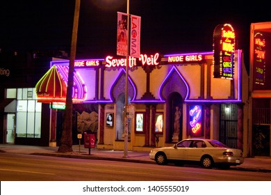 HOLLYWOOD, CALIFORNIA / USA - AUGUST 30 2004: Seventh Veil Gentlemen's Club With Nude Girls On Sunset Blvd. In Hollywood At Night.