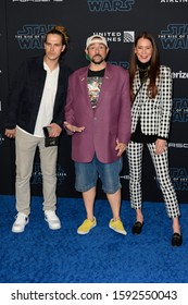 HOLLYWOOD, CALIFORNIA / USA - DECEMBER 16, 2019: Actor Jason Mewes (L), Director/writer Kevin Smith (m) And Producer Jennifer Schwalbach Smith (r) Attends The Premiere Of Disney's 