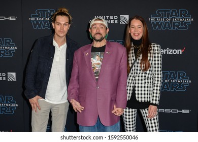 HOLLYWOOD, CALIFORNIA / USA - DECEMBER 16, 2019: Actor Jason Mewes (L), Director/writer Kevin Smith (m) And Producer Jennifer Schwalbach Smith (r) Attends The Premiere Of Disney's 