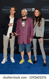 HOLLYWOOD, CALIFORNIA / USA - DECEMBER 16, 2019: Actor Jason Mewes (L), Director/writer Kevin Smith (m) And Producer Jennifer Schwalbach Smith (r) Attends The Premiere Of Disney's 