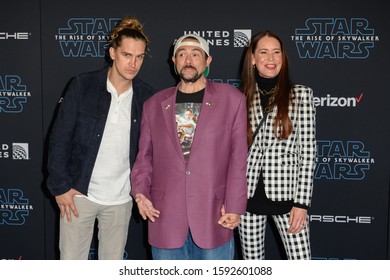 HOLLYWOOD, CALIFORNIA / USA - DECEMBER 16, 2019: Actor Jason Mewes (L), Director/writer Kevin Smith (m) And Producer Jennifer Schwalbach Smith (r) Attends The Premiere Of Disney's 