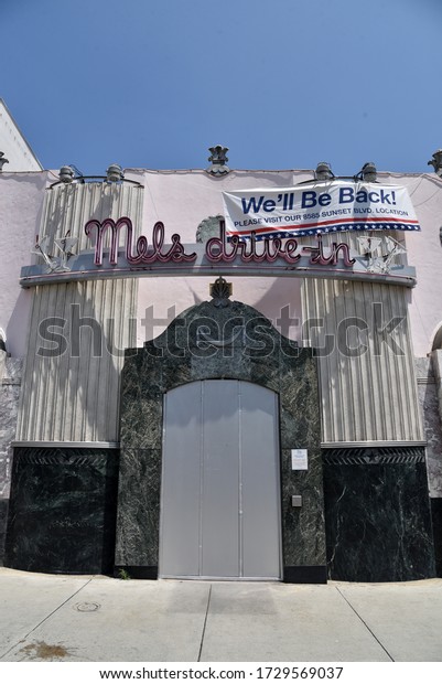 Hollywood,\
CA/USA - May 9, 2020: We\'ll be back banner on famous Mel\'s Drive In\
Restaurant during coronavirus\
quarantine