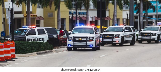 Hollywood, Florida/USA - June 07, 2020: Police Officers On Protest Against The Death In Minneapolis Police Custody Of African-American Man George Floyd. Peoples Holds Sign In Hands. Matte, Back Focus.