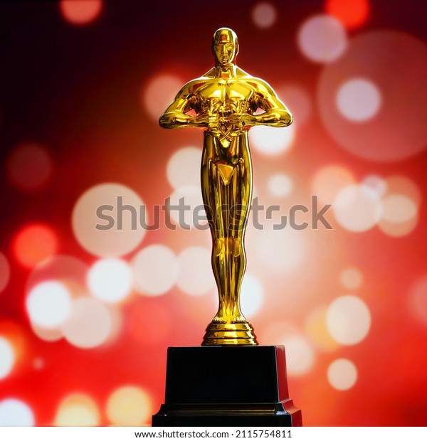 Hollywood\
Golden Oscar Academy award statue on light rays on black background\
with copy space. Success and victory\
concept.