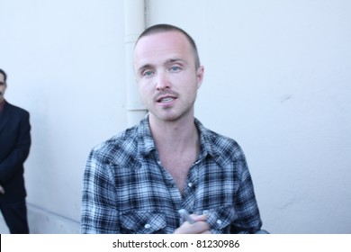 HOLLYWOOD - JULY 18, 2011: Breaking Bad actor Aaron Paul talking to fans after appearance on the Jimmy Kimmel Show outside the Jimmy Kimmel Studios July 18, 2011 Hollywood, Ca.