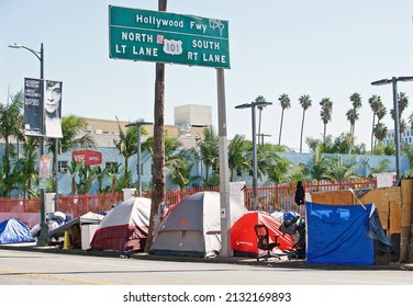 HOLLYWOODCALIFORNIA - FEB. 26, 2022: Homeless encampment along the roadside depicting the ever growing epidemic of homelessness. Los Angeles, California USA