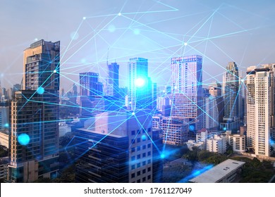 Hologram of abstract technology glowing icons, panoramic cityscape of Bangkok at sunset, Asia. The concept of worlds technological changes. Double exposure. - Shutterstock ID 1761127049