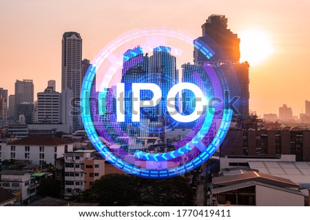 Hologram of IPO glowing icon, sunset panoramic city view of Bangkok. The financial hub for transnational companies in Asia. The concept of boosting the growth by IPO process. Double exposure.