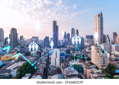 Hologram of social media icons over sunset panoramic cityscape of Bangkok, Asia. The concept of people connections. Multi exposure.