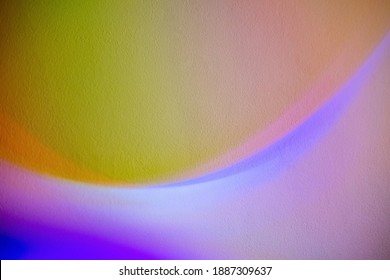 Holographic art background  Color gradient  Blur blue purple fluorescent neon light iridescent curve lines illumination defocused pink yellow copy space abstract banner and grain texture 