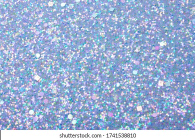 Holographic Bright Light Blue Glitter Real Texture Background.
