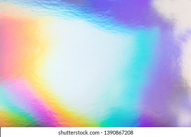 Holographic Foil Paper Close-up. Modern Trendy Colorful Background