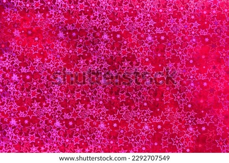 Holographic paper with a geometric pattern. Background or backdrop, graphic resource