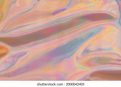 Holographic Pastel Rose Gold Color Wrinkled Pearlescent  Foil. Holography Pale Pink Fabric Abstract Background. Trendy Creative Pastel Pale Pink Blue Gradient.