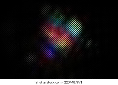 Holographic rainbow multicolor light. Glares with spectral gradient on a dark background. Imitation of rainbow color. Background with texture.