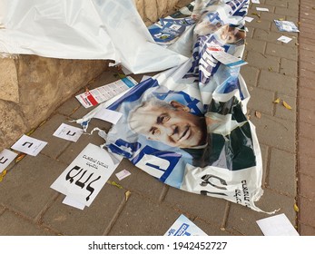 HOLON, ISRAEL. March 24, 2021. Benjamin Netanyahu Of Likud Political Ads Torn On The Ground. Political Propaganda, Slogans And Flyers Left On The Street After The Israel Knesset Elections 2021.