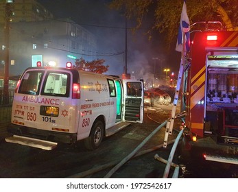 HOLON, ISRAEL. May 11, 2021. The Immediate Aftermath Of The Palestinian Rocket Hitting A Passenger Bus In Central Israel. Emergency Services, Israel Hamas Gaza War Concept Image.