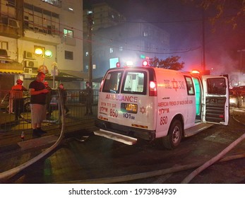 HOLON, ISRAEL. May 11, 2021. The Immediate Aftermath Of The Palestinian Rocket Hitting A Passenger Bus In Central Israel. Emergency Services, Israel Hamas Gaza War Concept Image.