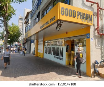 HOLON, ISRAEL. September 19, 2019. Yellow exterior view with a logo and entrance to the Good Pharm pharmacy chain store in the downtown Holon.
