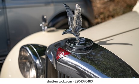 Holt, Norfolk, UK - September 18 2022. Close And Selective Focus On A Flying Mallard Hood Ornament Made From Chrome