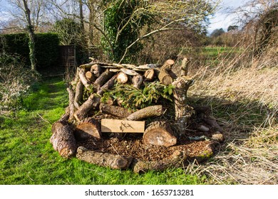 Holt Wiltshire UK February 13 2020 Bug Hotel.  A Construction Of Logs, Branches And Woodchips Made By A Local Youth Club To Provide A Suitable Environment For Wild Insects In Holt Wiltshire