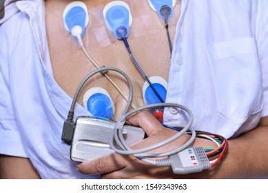 Holter Monitor With Electrode Pads On The Patien Breast  For Check The Heart Rate In Cardiac Arrhythmia 